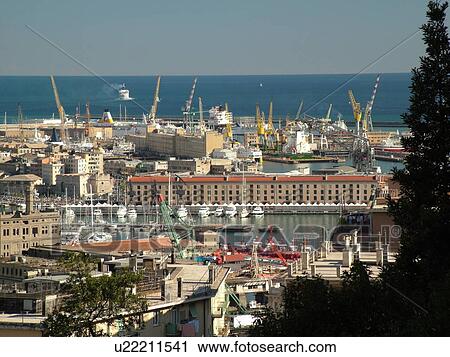 Genoa, Genova, Liguria, Italy, Europe, View of the city and the harbor of Genoa along the Ligurian Sea. View Large Photo Image Stock Image - Genoa, Genova, Liguria, Italy, Europe, View of the city and the harbor of Genoa along the Ligurian Sea.. Fotosearch