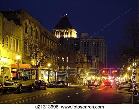 Stock Photograph -  Greensboro, NC, North Carolina, Downtown, evening. Fotosearch