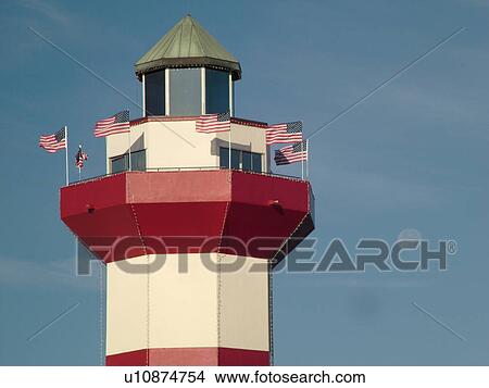 Hilton Head Island, SC, South Carolina, Harbour Town, Sea Pines, Harbour Town Yacht Basin, red and white striped lighthouse View Large Photo Image Picture - Hilton Head Island, SC, South Carolina, Harbour Town, Sea Pines, Harbour Town Yacht Basin, red and white striped lighthouse. Fotosearch