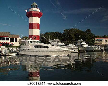 Hilton Head Island, SC, South Carolina, Harbour Town, Sea Pines, Harbour Town Yacht Basin, lighthouse, marina View Large Photo Image Picture - Hilton Head Island, SC, South Carolina, Harbour Town, Sea Pines, Harbour Town Yacht Basin, lighthouse, marina. Fotosearch