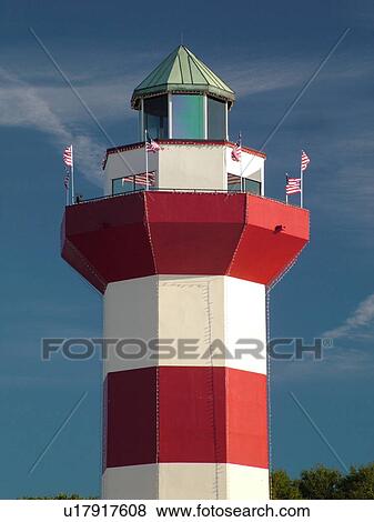 Hilton Head Island, SC, South Carolina, Harbour Town, Sea Pines, Harbour Town Yacht Basin, red and white striped lighthouse View Large Photo Image Stock Photo - Hilton Head Island, SC, South Carolina, Harbour Town, Sea Pines, Harbour Town Yacht Basin, red and white striped lighthouse. Fotosearch