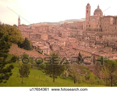 Stock Image -  Italy, Marche, Urbino, Europe, Scenic view of the medieval hill town of Urbino.. Fotosearch