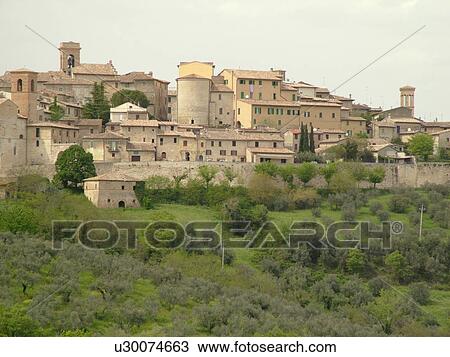Italy, Montefalco, Umbria, Italy, Europe, Scenic view of the medieval walled city on Montefalco and the greenish-grey olive trees on the hillsides of Umbria. View Large Photo Image Stock Image - Italy, Montefalco, Umbria, Italy, Europe, Scenic view of the medieval walled city on Montefalco and the greenish-grey olive trees on the hillsides of Umbria.. Fotosearch