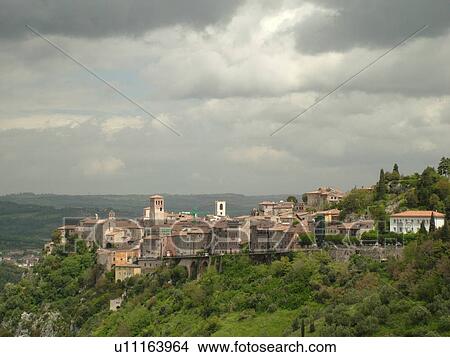 Picture -  Italy, Narni, Umbria, Europe, Scenic view of the medieval walled hill town of Narni.. Fotosearch