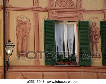 Stock Image -  Italy, Rapallo, Riviera di Levante, Liguria, Ligurian Riviera, Europe, Fresco painting on the wall of a building in the resort town of Rapallo along the Ligurian Sea.. Fotosearch