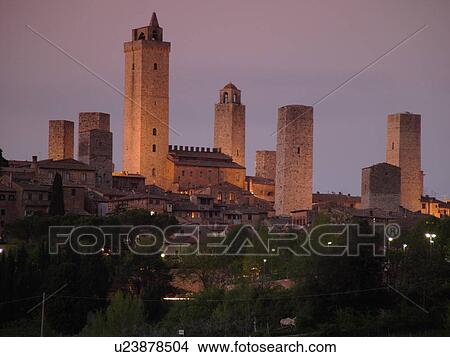 Italy, San Gimignano, Toscana, Tuscany, Europe, Scenic view of the medieval town of San Gimignano in the evening in the Chianti Region. View Large Photo Image Picture - Italy, San Gimignano, Toscana, Tuscany, Europe, Scenic view of the medieval town of San Gimignano in the evening in the Chianti Region.. Fotosearch