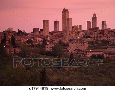 Italy, San Gimignano, Toscana, Tuscany, Europe, Scenic view of the medieval town of San Gimignano at sunrise in the Chianti Region. View Large Photo Image Stock Photo - Italy, San Gimignano, Toscana, Tuscany, Europe, Scenic view of the medieval town of San Gimignano at sunrise in the Chianti Region.. Fotosearch