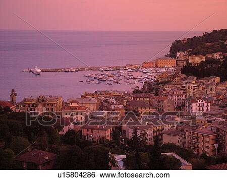 Italy, Santa Margherita Ligure, Liguria, Riviera di Levante, Ligurian Riviera, Europe, Scenic view of the resort town of Santa Margherita Ligure on the Gulf of Tigullio (Gulfo di Tigullo) at sunset along the Ligurian Sea on the Ligurian Riviera. View Large Photo Image Stock Photograph - Italy, Santa Margherita Ligure, Liguria, Riviera di Levante, Ligurian Riviera, Europe, Scenic view of the resort town of Santa Margherita Ligure on the Gulf of Tigullio (Gulfo di Tigullo) at sunset along the Ligurian Sea on the Ligurian Riviera.. Fotosearch