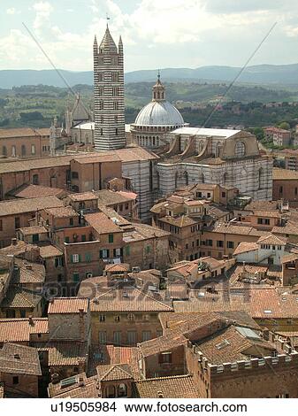Picture -  Italy, Siena, Toscana, Tuscany, Europe, Aerial view of the Duomo Campanile and the city of Siena from Torre del Mangia.. Fotosearch