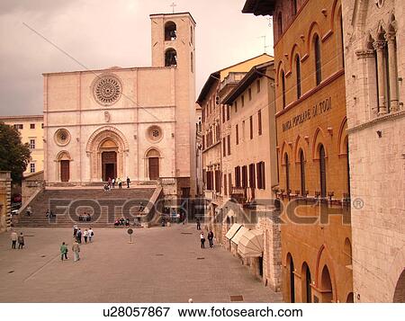 Stock Photo -  Italy, Todi, Umbria, Europe, Palazzo del Popolo and Palazzo de Capitano and Cathedral in the Piazza del Popolo in the medieval hilltop town of Todi.. Fotosearch