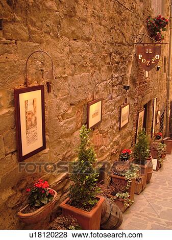 Stock Photo -  Italy, Tuscany, Cortona, Toscana, Europe, Art gallery along a narrow street in downtown Cortona.. Fotosearch