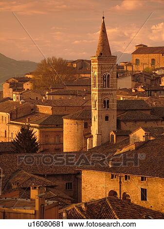 Stock Image -  Italy, Urbino, Marche, Europe, Scenic view of the medieval hill town of Urbino at sunrise.. Fotosearch