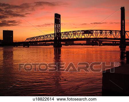 Picture -  Jacksonville, FL, Florida, Main Street Bridge crossing the St. Johns River at sunset. Fotosearch