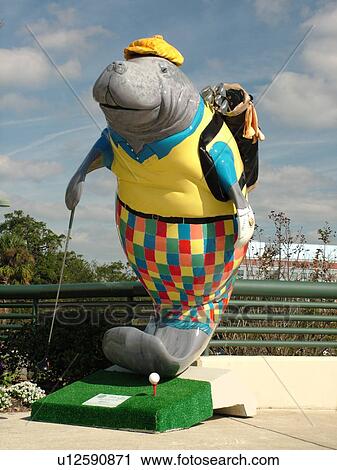 Stock Image -  Jacksonville, FL, Florida, Man of Golfatee fiberglass statue, The Manatees of Jacksonville in South Jacksonville. Fotosearch
