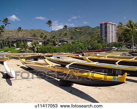 Stock Image -  Kuliouou, Oahu, Honolulu, HI, Hawaii, Kuliouou Beach Park, Maunalua Bay, outrigger sea canoes. Fotosearch