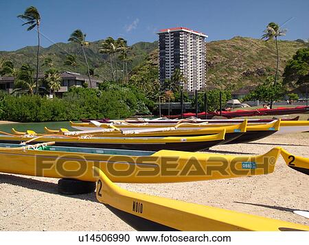Stock Image -  Kuliouou, Oahu, Honolulu, HI, Hawaii, Kuliouou Beach Park, Maunalua Bay, outrigger sea canoes. Fotosearch