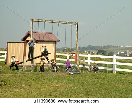 Lancaster County, PA, Pennsylvania, Amish, school, children playing on playground equipment View Large Photo Image Stock Photo - Lancaster County, PA, Pennsylvania, Amish, school, children playing on playground equipment. Fotosearch