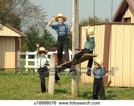 Lancaster County, PA, Pennsylvania, Amish, school, children playing on playground equipment View Large Photo Image Stock Photograph - Lancaster County, PA, Pennsylvania, Amish, school, children playing on playground equipment. Fotosearch