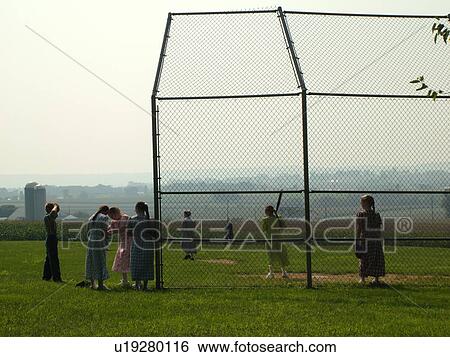 Stock Photograph -  Lancaster County, PA, Pennsylvania, Amish, baseball game, teenagers. Fotosearch