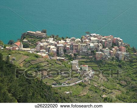 Liguria, Italy, Cinque Terre, Corniglia, Riviera di Levante, Ligurian Riviera, Europe, Scenic view of Corniglia, a Cinque Terre village, along the Ligurian Sea. View Large Photo Image Stock Image - Liguria, Italy, Cinque Terre, Corniglia, Riviera di Levante, Ligurian Riviera, Europe, Scenic view of Corniglia, a Cinque Terre village, along the Ligurian Sea.. Fotosearch