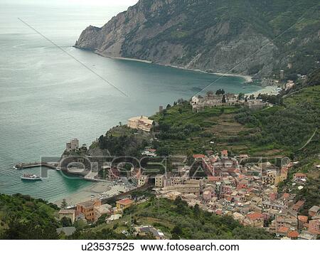 Liguria, Italy, Cinque Terre, Monterosso al Mare, Riviera di Levante, Ligurian Riviera, Europe, Scenic view of Monterosso al Mare, a Cinque Terre village, along the steep rocky coastline of the Ligurian Sea. View Large Photo Image Stock Photography - Liguria, Italy, Cinque Terre, Monterosso al Mare, Riviera di Levante, Ligurian Riviera, Europe, Scenic view of Monterosso al Mare, a Cinque Terre village, along the steep rocky coastline of the Ligurian Sea.. Fotosearch