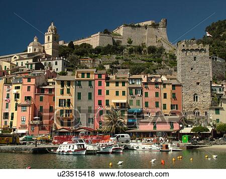 Liguria, Italy, Portovenere, Riviera di Levante, Ligurian Riviera, Europe, The waterfront and fortress above in the resort town of Portovenere along the Ligurian Sea. View Large Photo Image Stock Photo - Liguria, Italy, Portovenere, Riviera di Levante, Ligurian Riviera, Europe, The waterfront and fortress above in the resort town of Portovenere along the Ligurian Sea.. Fotosearch