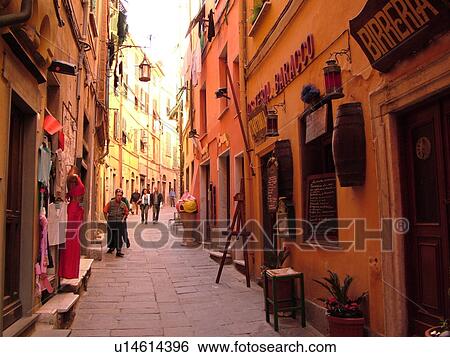 Liguria, Italy, Portovenere, Riviera di Levante, Ligurian Riviera, Europe, Shops along the narrow streets of the resort town of Portovenere along the Ligurian Sea. View Large Photo Image Stock Photograph - Liguria, Italy, Portovenere, Riviera di Levante, Ligurian Riviera, Europe, Shops along the narrow streets of the resort town of Portovenere along the Ligurian Sea.. Fotosearch