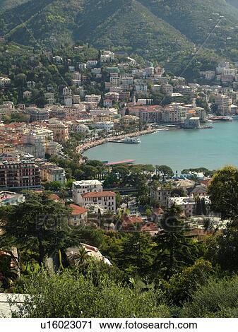 Liguria, Italy, Rapallo, Riviera di Levante, Ligurian Riviera, Europe, Scenic view of the resort town of Rapallo on the Gulf of Tigullio (Gulfo di Tigullio) along the Ligurian Sea on the Ligurian Riviera. View Large Photo Image Stock Image - Liguria, Italy, Rapallo, Riviera di Levante, Ligurian Riviera, Europe, Scenic view of the resort town of Rapallo on the Gulf of Tigullio (Gulfo di Tigullio) along the Ligurian Sea on the Ligurian Riviera.. Fotosearch
