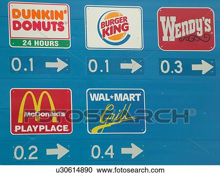 Stock Image -  Maine, blue, directional, road sign, fast food. Fotosearch