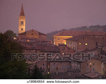 Picture -  Marche, Italy, Urbino, Europe, Scenic view of the medieval hill town of Urbino in the evening.. Fotosearch