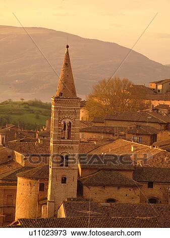 Stock Image -  Marche, Italy, Urbino, Europe, Scenic view of the medieval hill town of Urbino at sunrise.. Fotosearch