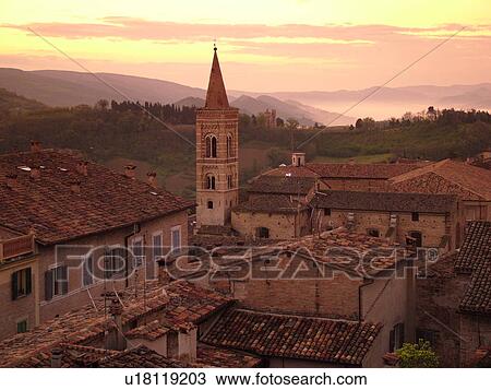 Stock Image -  Marche, Italy, Urbino, Europe, Scenic view of the medieval hill town of Urbino at sunrise.. Fotosearch