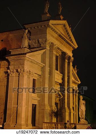 Stock Image -  Marche, Italy, Urbino, Europe, Basilica Metropolitana in the medieval town of Urbino in the evening.. Fotosearch