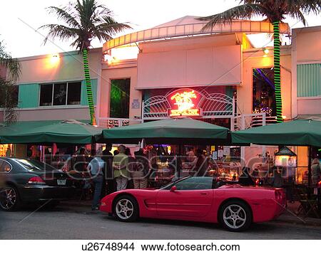 Miami Beach, South Beach, FL, Florida, Ocean Drive, American Riviera, Art Deco District, Tropical Cafe, evening View Large Photo Image Picture - Miami Beach, South Beach, FL, Florida, Ocean Drive, American Riviera, Art Deco District, Tropical Cafe, evening. Fotosearch