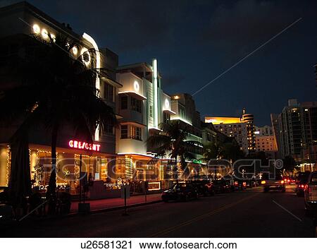 Stock Image -  Miami Beach, South Beach, FL, Florida, Ocean Drive, American Riviera, Art Deco District, buildings, evening. Fotosearch