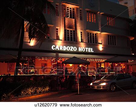 Miami Beach, South Beach, FL, Florida, Ocean Drive, American Riviera, Art Deco District, Cordozo Hotel, evening View Large Photo Image Stock Photo - Miami Beach, South Beach, FL, Florida, Ocean Drive, American Riviera, Art Deco District, Cordozo Hotel, evening. Fotosearch