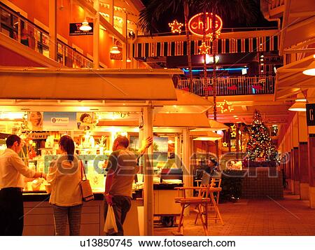 Stock Photography -  Miami, FL, Florida, Biscayne Bay, Bayside Marketplace, evenings, interior. Fotosearch