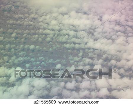 Mid-West, Aerial, clouds, airplane flying over the Midwest View Large Photo Image Stock Photo - Mid-West, Aerial, clouds, airplane flying over the Midwest. Fotosearch