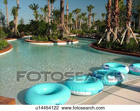Stock Image -  Orlando, FL, Florida, Champions Gate, Golf Resort, river pool, swimming pool. Fotosearch