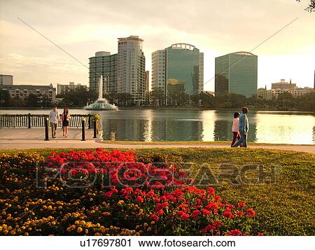 Stock Image -  Orlando, FL, Florida, Downtown skyline, Lake Eola, Lake Eola Park. Fotosearch