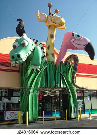 Orlando, FL, Florida, gift shop, Disney souvenirs, giant dragon, giraffe, flamingo heads View Large Photo Image Picture - Orlando, FL, Florida, gift shop, Disney souvenirs, giant dragon, giraffe, flamingo heads. Fotosearch
