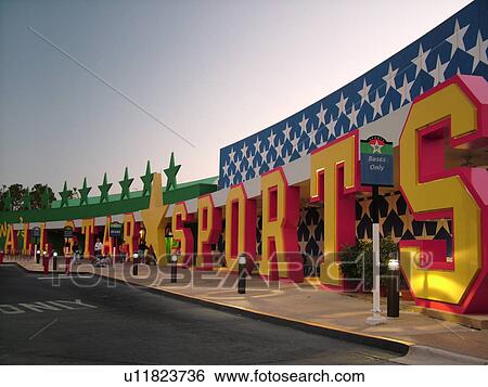 Stock Photograph -  Orlando, FL, Florida, Lake Buena Vista, Disney's All-Star Sports Resort, evening. Fotosearch