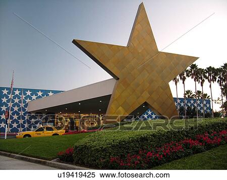 Stock Photography -  Orlando, FL, Florida, Lake Buena Vista, Disney's All-Star Sports Resort, giant gold star. Fotosearch