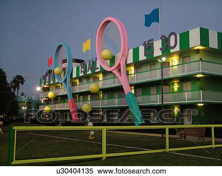 Orlando, FL, Florida, Lake Buena Vista, Disney's All-Star Sports Resort, evening, giant tennis rackets and balls, tennis court View Large Photo Image Stock Photography - Orlando, FL, Florida, Lake Buena Vista, Disney's All-Star Sports Resort, evening, giant tennis rackets and balls, tennis court. Fotosearch