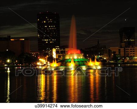 Orlando, FL, Florida, Lake Eola, colorfully lighted Clinton Allen Fountain, evening View Large Photo Image Picture - Orlando, FL, Florida, Lake Eola, colorfully lighted Clinton Allen Fountain, evening. Fotosearch