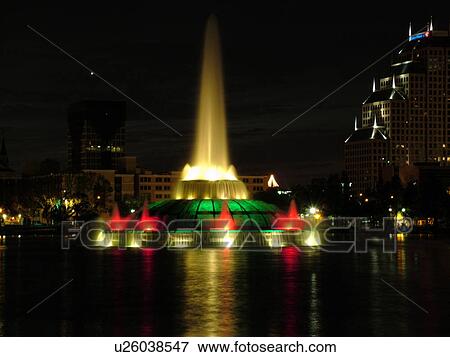 Orlando, FL, Florida, Lake Eola, colorfully lighted Clinton Allen Fountain, evening View Large Photo Image Stock Photo - Orlando, FL, Florida, Lake Eola, colorfully lighted Clinton Allen Fountain, evening. Fotosearch