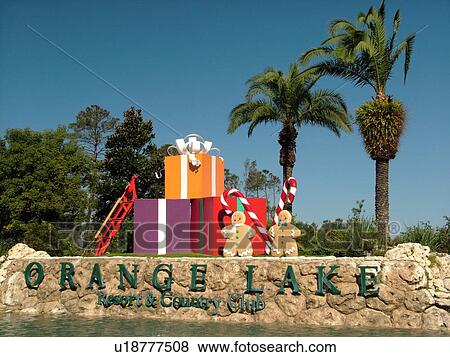 Orlando, FL, Florida, Orange Lake Country Club and Resort, entrance, Christmas decorations of gingerbread men, candy canes, sled, and gift boxes View Large Photo Image Stock Photo - Orlando, FL, Florida, Orange Lake Country Club and Resort, entrance, Christmas decorations of gingerbread men, candy canes, sled, and gift boxes. Fotosearch