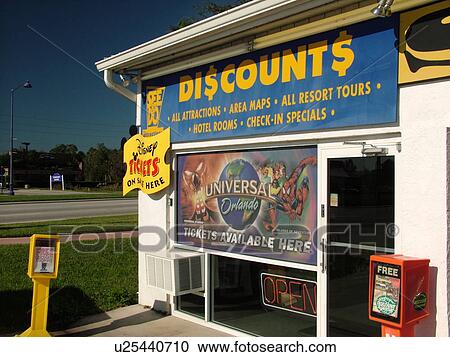 Stock Image -  Orlando, FL, Florida, ticket stand, Discount Disney and Universal Tickets. Fotosearch