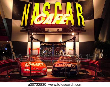 Stock Image -  Orlando, FL, Florida, Universal Orlando Resort, NASCAR CafT, evening. Fotosearch