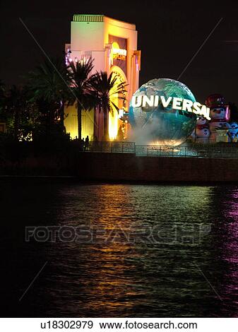 Stock Photo -  Orlando, FL, Florida, Universal Studios, Universal Orlando Resort, Universal Studios Globe, evening. Fotosearch
